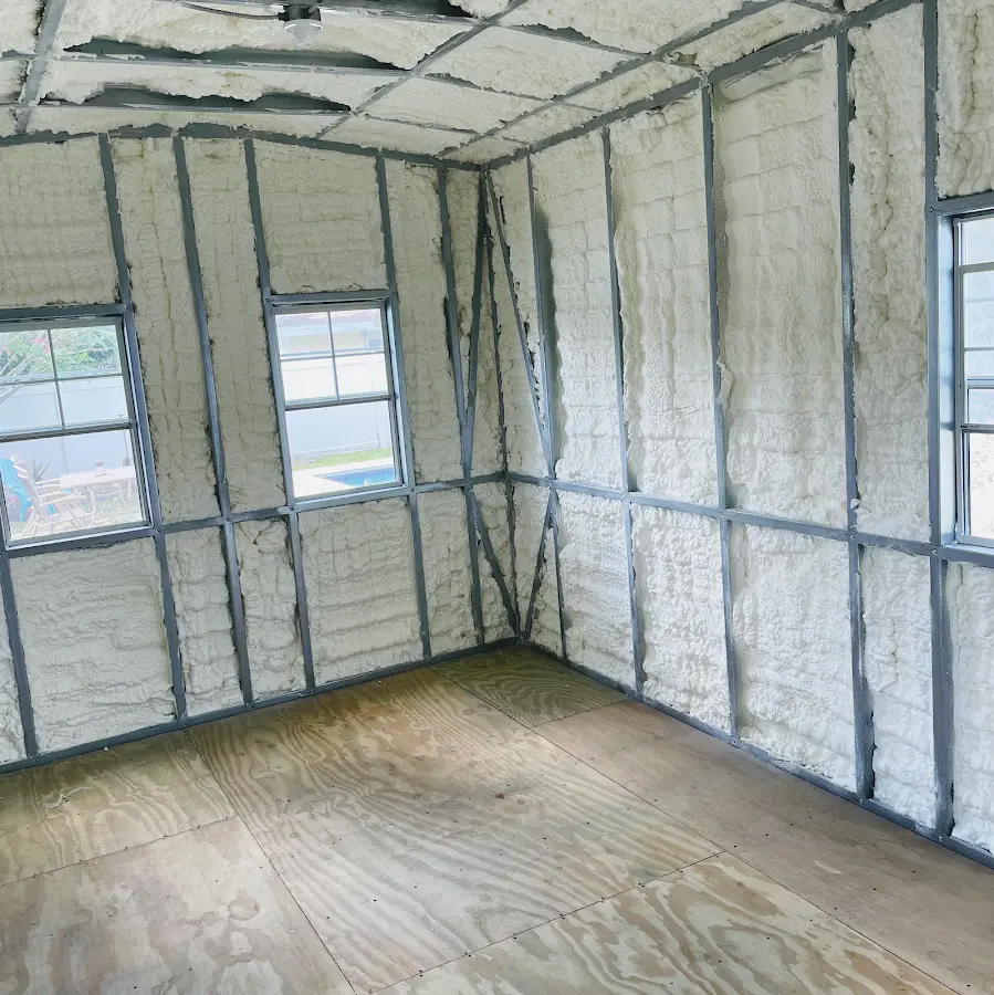Closed-cell spray foam insulation applied to wall cavities in a residential project in Blackstone